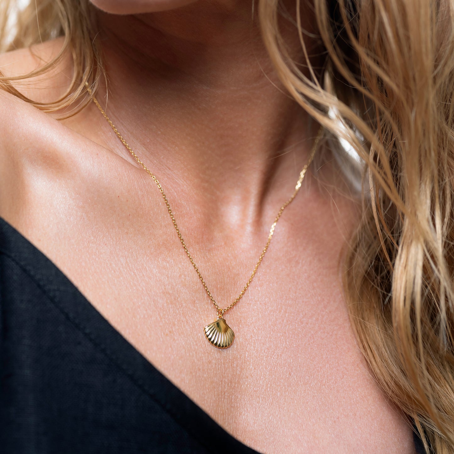 Petite golden seashell necklace