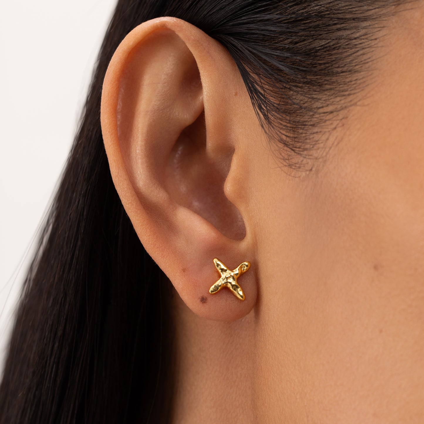 Cross golden stud earrings