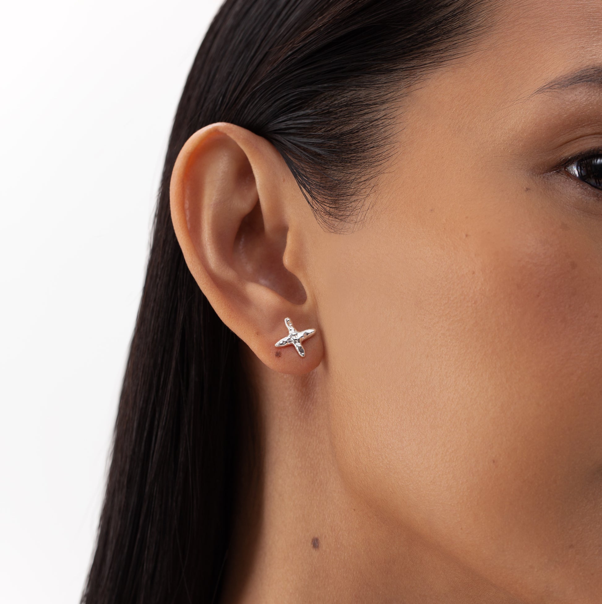 cross  earring, silver stud earrings, 925 silver earrings, rhodium plated, hypoallergenic, second close-up
